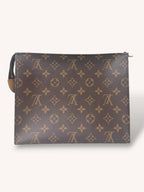 Poche Toilette Monogram Coated Canvas