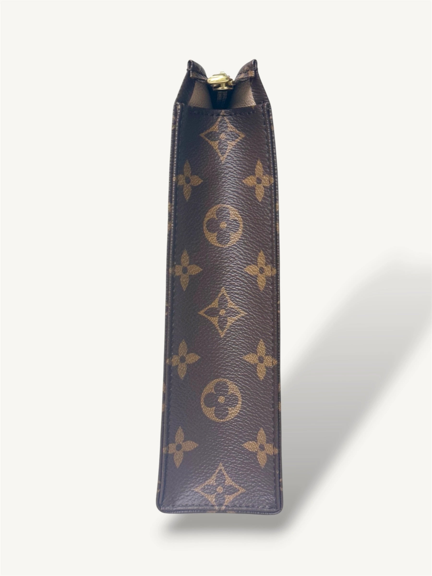 Poche Toilette Monogram Coated Canvas