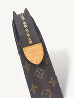 Poche Toilette Monogram Coated Canvas