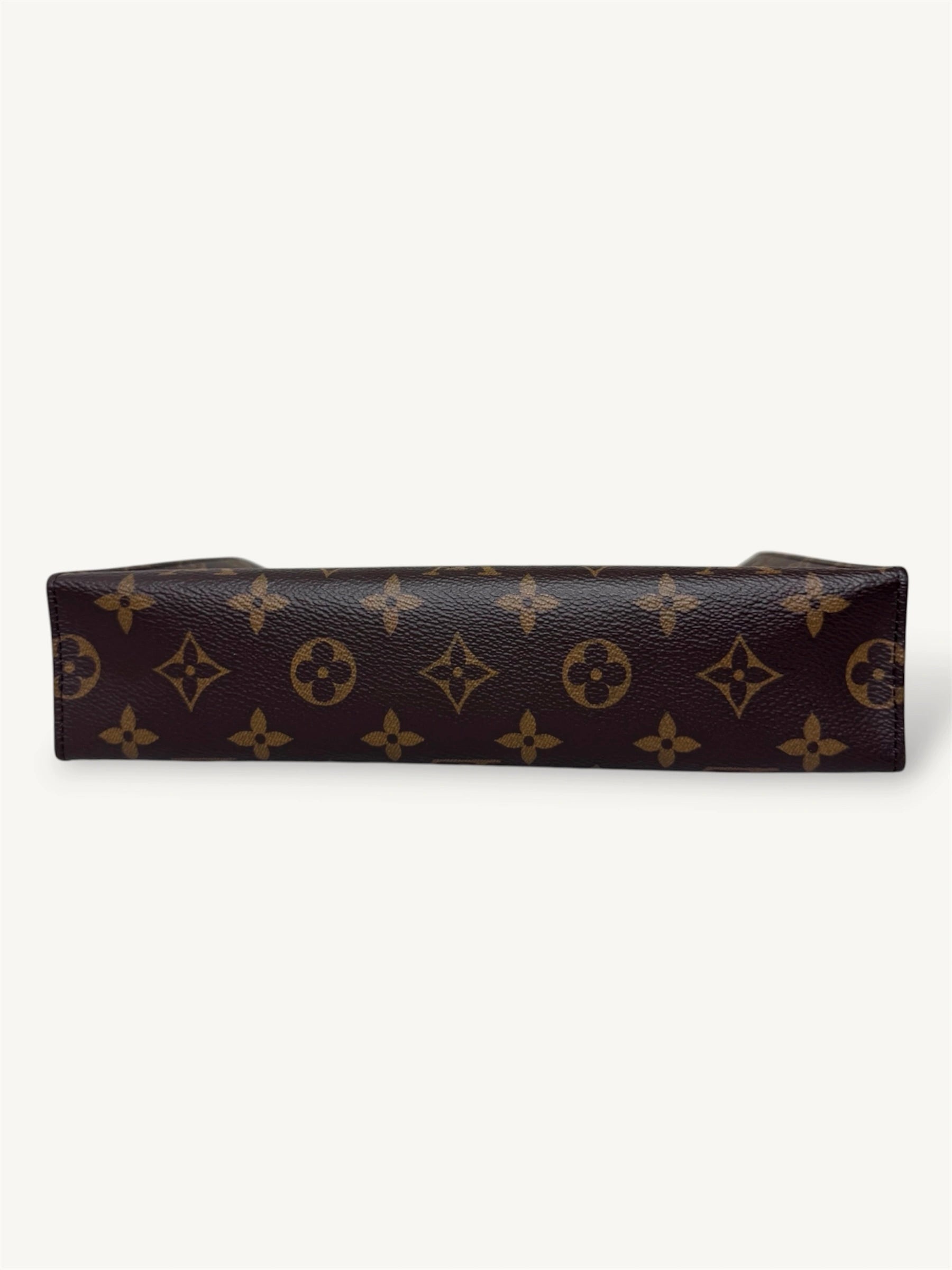 Poche Toilette Monogram Coated Canvas