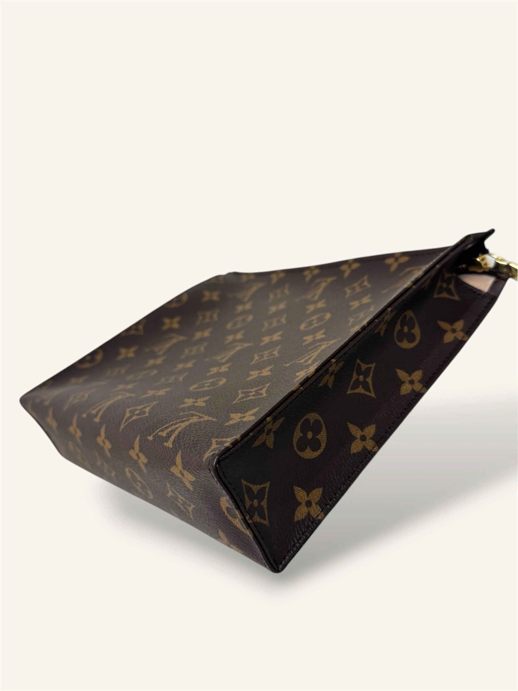 Poche Toilette Monogram Coated Canvas