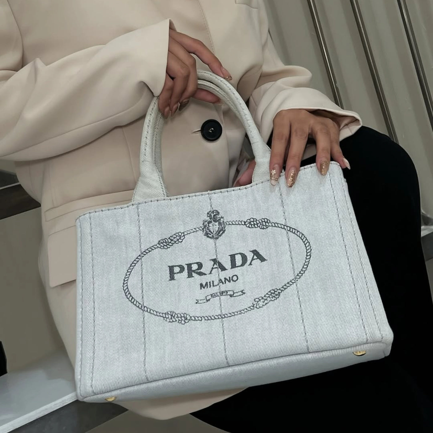 White Prada tote bag featured by Jess Luxuriesse