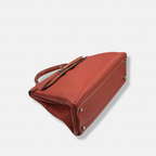 Kelly 32 Handbag Taurillion Clemence Orange Palladium Hardware