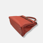 Kelly 32 Handbag Taurillion Clemence Orange Palladium Hardware