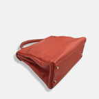 Kelly 32 Handbag Taurillion Clemence Orange Palladium Hardware