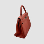 Kelly 32 Handbag Taurillion Clemence Orange Palladium Hardware